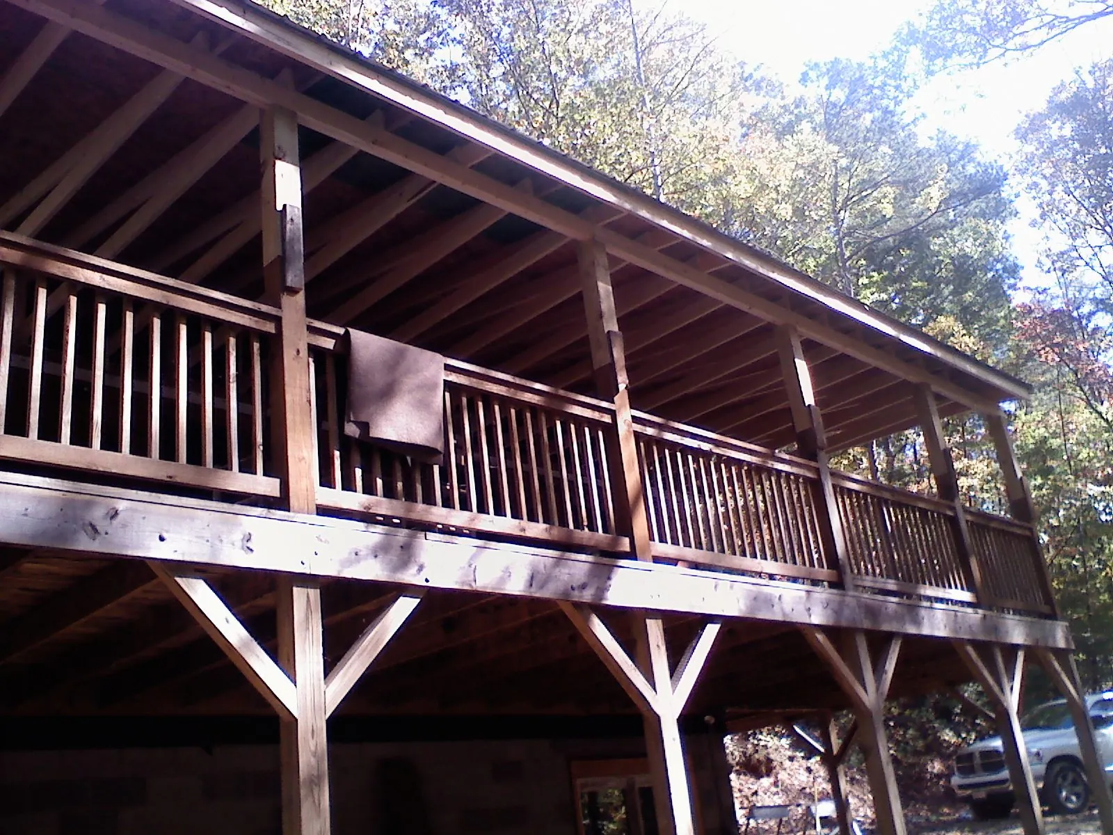 Timber framing under a new elevated porch and deck — Roof Leak Repair in Defuniak Springs by Roofing Brothers